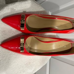 Michael Kors 5 inch burnt orange worn once heals.
